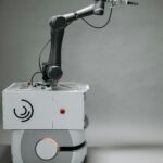 Explore cutting-edge robotic arm designed for modern industrial applications. Ideal for tech and AI themes.